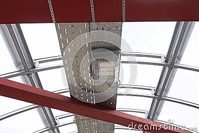 A rectangular industrial street lamp, mounted on the ceiling in the transition. Modern pedestrian crossing lighting lamp Stock Photo