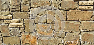 Rectangular stones wall from a natural stone background Stock Photo