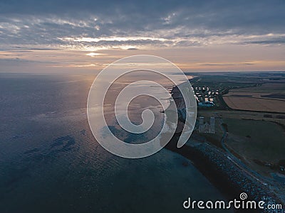 Drone aerial shot of Remains of Reculver church towers at early october sunrise early october sunrise Stock Photo