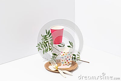 Recyclable paper tableware and cornstarch cutlery over white background Stock Photo