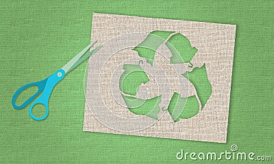 recycle clothes symbol recycle sign cut from reuse fabric on a textile background with scissors Stock Photo