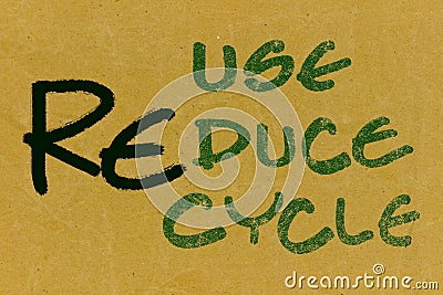 Recycle-Reuse-Reduce text on recycled paper Stock Photo