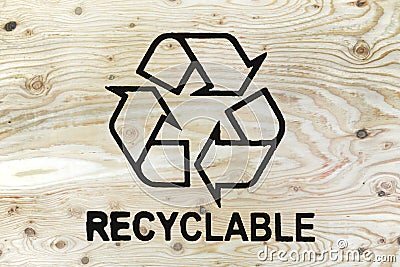 Recycle symbol on wood planks. Save the planet. Stock Photo