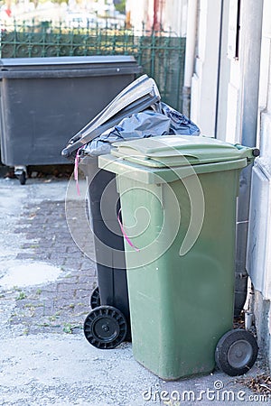 Recycle trash can garbage stock rubbish bin dustbins in street urban outside Stock Photo