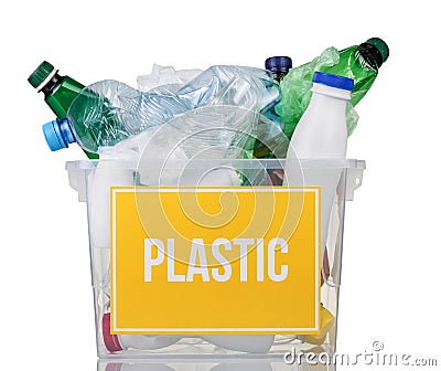 Recycling concept. Container with plastic bottles and plastic inscription on yellow isolated Stock Photo