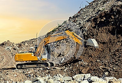 Recycling concrete and construction waste from demolition. Excavator at landfill of the disposa. Reuse of building rubble. Backhoe Editorial Stock Photo