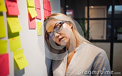 Recycling and delay in the office until late, workaholism concept. Stock Photo