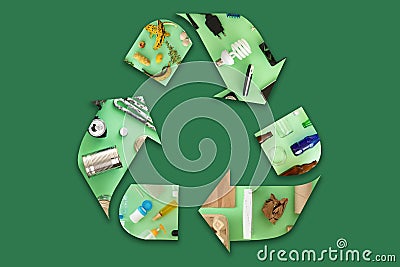 Recycling icon mocked up of different types of waste materials on green background. Stock Photo