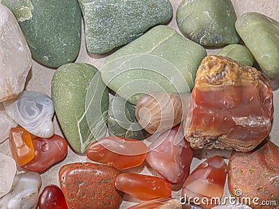 Red Agate, transparent quartz and serpentinite in green. Natural treasure. Stock Photo