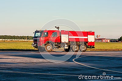 Red airfield fire truck at the airport Stock Photo