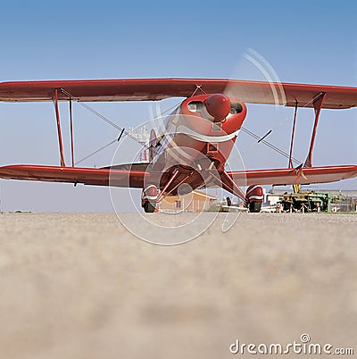 Red airplane ready to take off Stock Photo