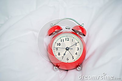 Red alarm clock Stock Photo