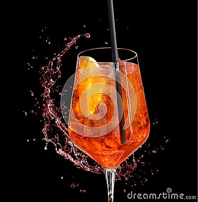 Red aperitif with straw and splash of water- red aperitif with straw and splash of water Stock Photo