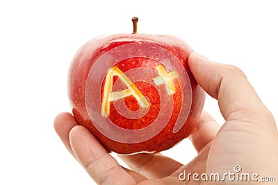 Red apple and A Plus sign Stock Photo