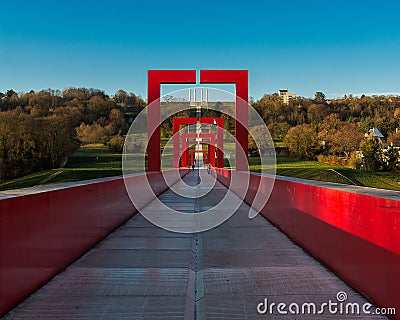 The red arches of the bridge over blue sky background Stock Photo