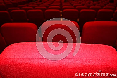 red armchairs. Empty concert hall, theater chairs background ... color photo, empty cinema or concert hall. The red Stock Photo