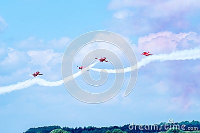 Red Arrow Aerobatic Team in the RIAT airshow in Fairford, England, UK Editorial Stock Photo
