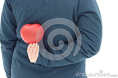 Red balloon in the shape of a heart man holds in his hands. gift on a frosty day on February 14-Valentine`s day. marriage proposa Stock Photo