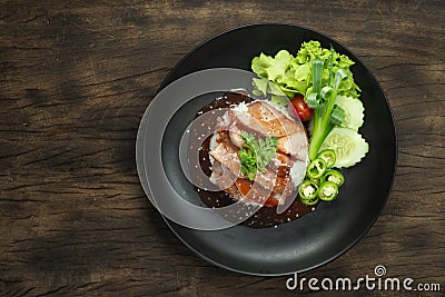 Red Barbeque Pork on Rice recipe with Red Sweet Sauce topped coriander leaf Decorate carved Stock Photo