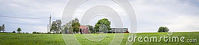 Red barn in sweden on a countryside Stock Photo