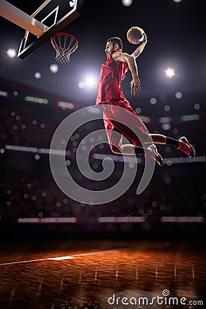 Red Basketball player in action Stock Photo