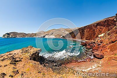 Red beach in Santorini island, Greece. Red volcanic cliffs and the blue sea Stock Photo