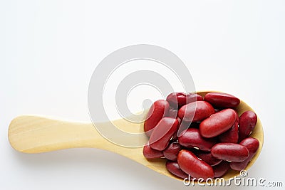 Red bean whole grain on the wooden spoon Stock Photo