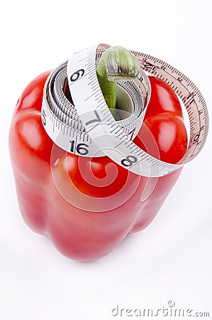 Red bell pepper with measuring tape Stock Photo