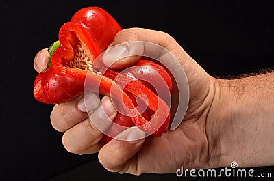 Red bell pepper squeezed Stock Photo