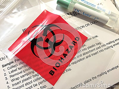 Red biohazard label mailer Stock Photo