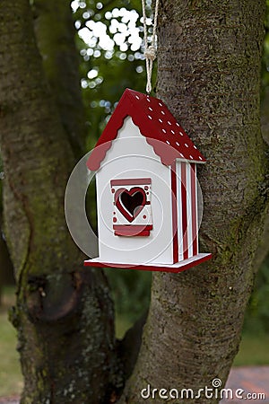 red bird house Stock Photo