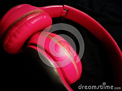 red black background object colours blur focus target earphone Stock Photo