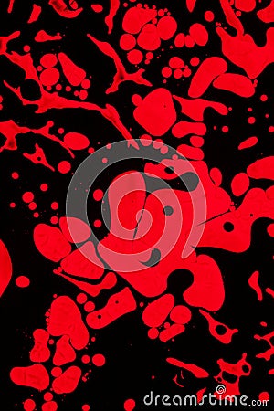 Red and Black swirls of ink Stock Photo