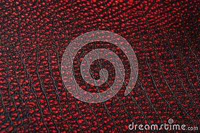 Red - black textured reptile skin, used texture for the background. Lizard or crocodile skin Stock Photo