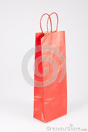 Red blank shopping bag for bootle mockup in grey background Stock Photo