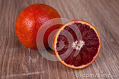 Red blood sicilian orange whole and half Stock Photo