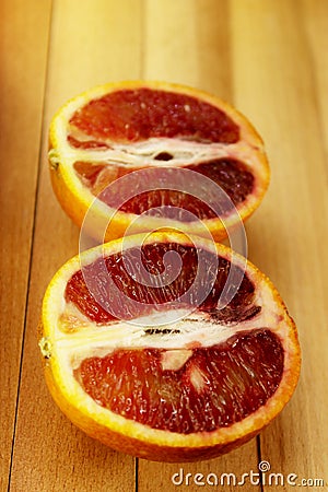 Red bloody orange on wooden light background Stock Photo