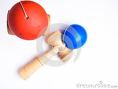 Red and blue Kendama japanese toys, isolated on white, competition concept Stock Photo