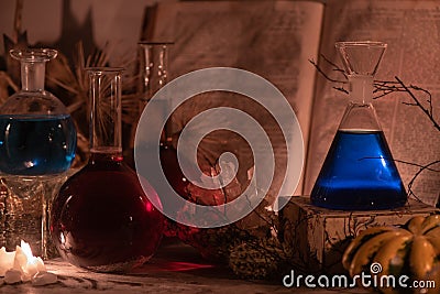 Magic potions and candle light Stock Photo