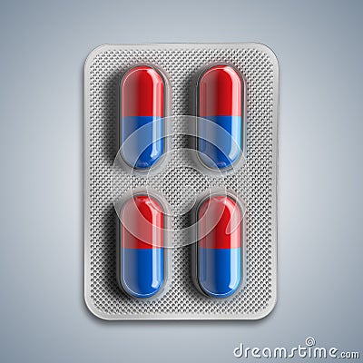 Red and blue pills in a blister on gray background Stock Photo