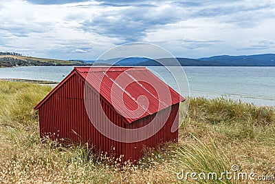 red boat shed at Dennes point Bruny Island Editorial Stock Photo