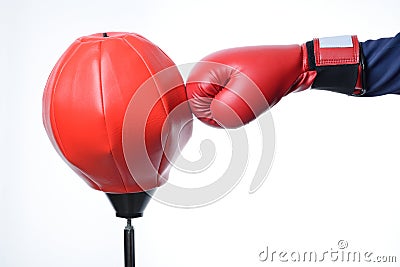 Red boxing glove punch a red punching bag exercises Stock Photo