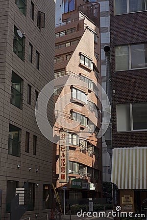 Red brick building bathed in light Editorial Stock Photo