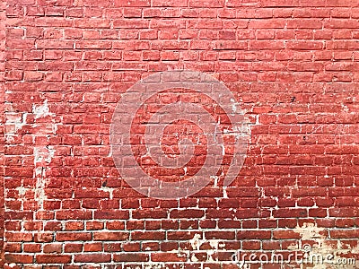 Red brick wall background with white paint. Stock Photo