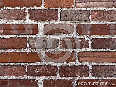 red brick wall texture bonded by concrete Stock Photo