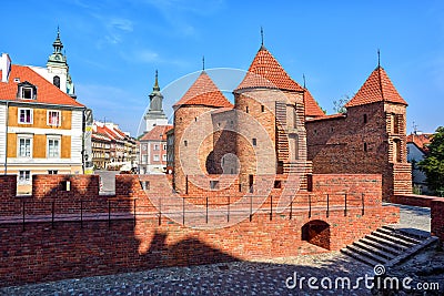 Red brick walls and towers of Warsaw Barbican, Poland Stock Photo