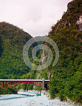 Red bridge, River and mountain at Toroko Gorge, Hualien, Taiwan Stock Photo