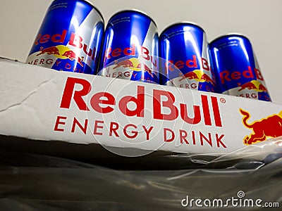Red Bull Energy Drink Cans in a Tray on a Shelf Editorial Stock Photo