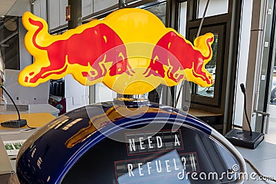 red Bull logo brand and text sign Energy Drink on fridge advertising can in market Editorial Stock Photo
