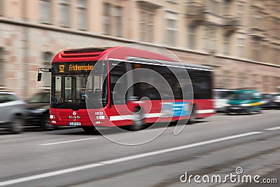 Red bus with motion blur. Editorial Stock Photo